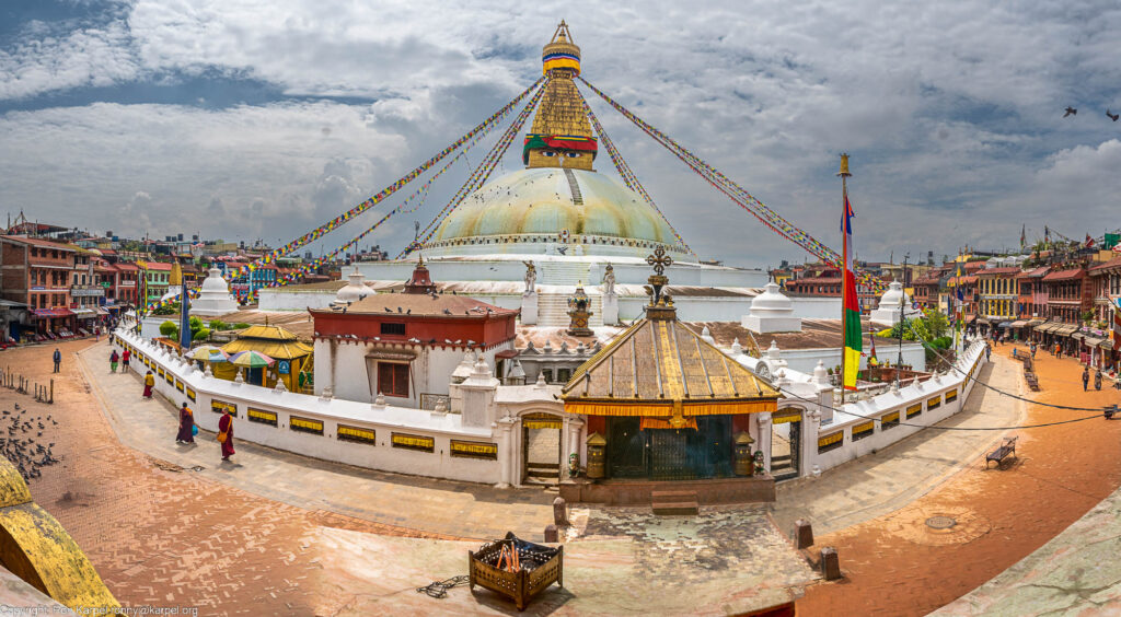 This whitewashed dome and gilded tower is one of the most important locations for the Buddhist religion in Nepal, Boudhanath Stupa, Kathmandu, Nepal